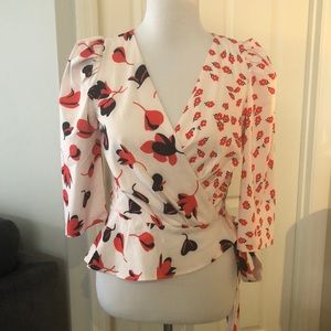Silky boutique cross top. Side zipper. Never worn.